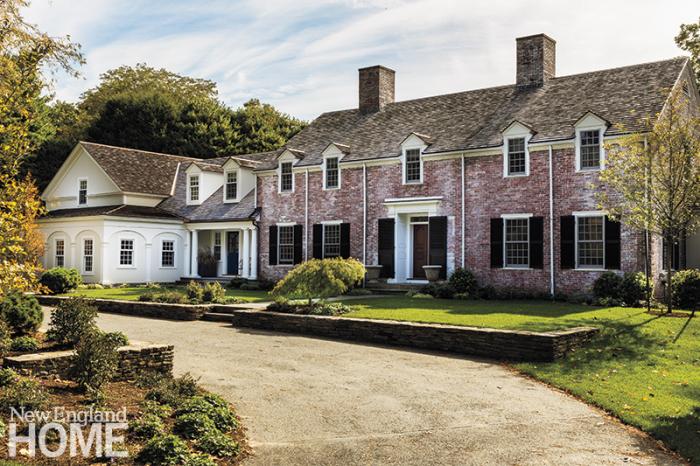 Architect Chip Dewing created an addition, clad in off-white clapboard, that is packed with personality but complements the original house.